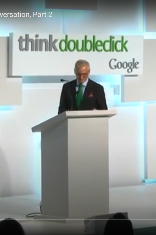 Peter standing at a podium at a Think DoubleClick Google event